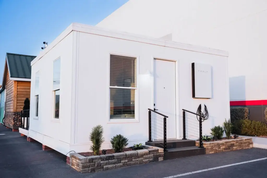Boxabl modular home showcasing modern design and energy-efficient features, with a welcoming entrance and landscaped surroundings, representing affordable housing solutions in San Diego.