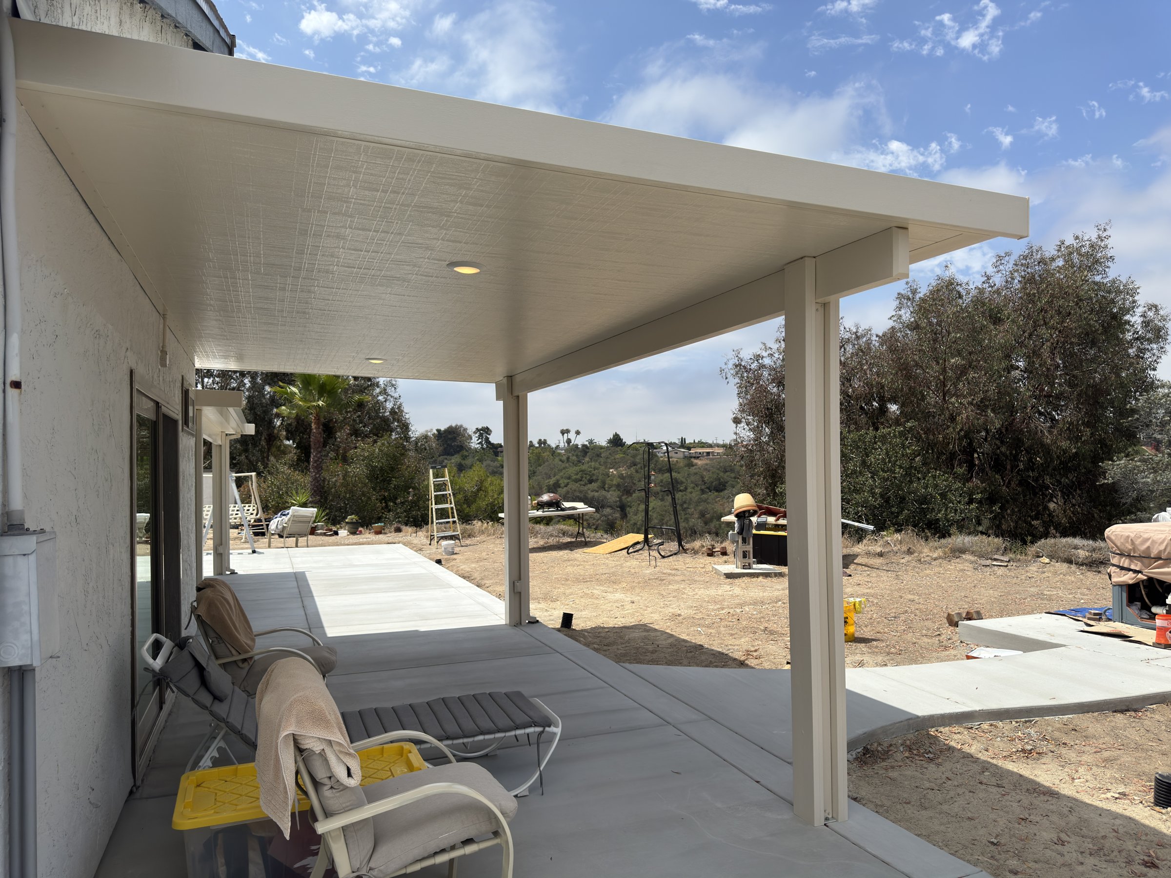 Southwest Builders - two Elitewood insulated aluminum patio covers on a North Clairemont, San Diego ranch home